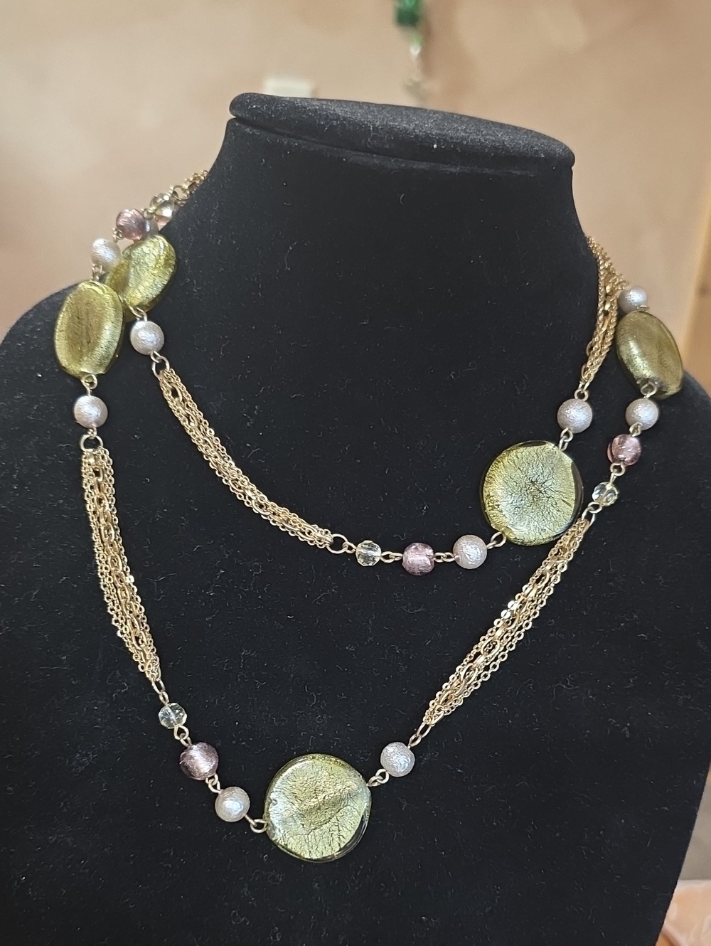 Gold-Tone Multi Strand Necklace with Green Glass Accents